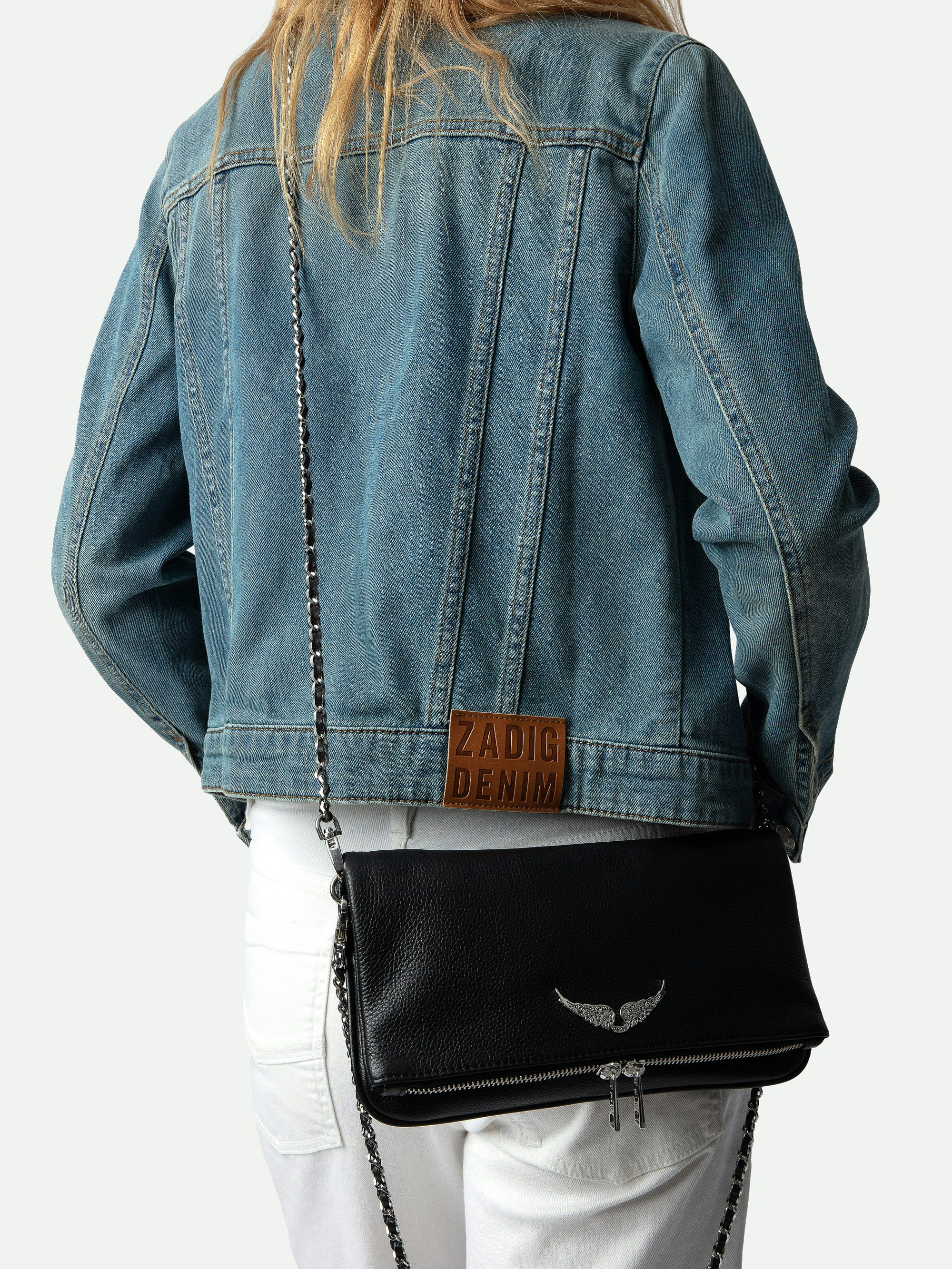 Rock Clutch - The iconic Rock women's leather clutch will take you seamlessly from day to evening.
It features a double chain and leather strap, so you can choose to wear it across the body or on the shoulder.